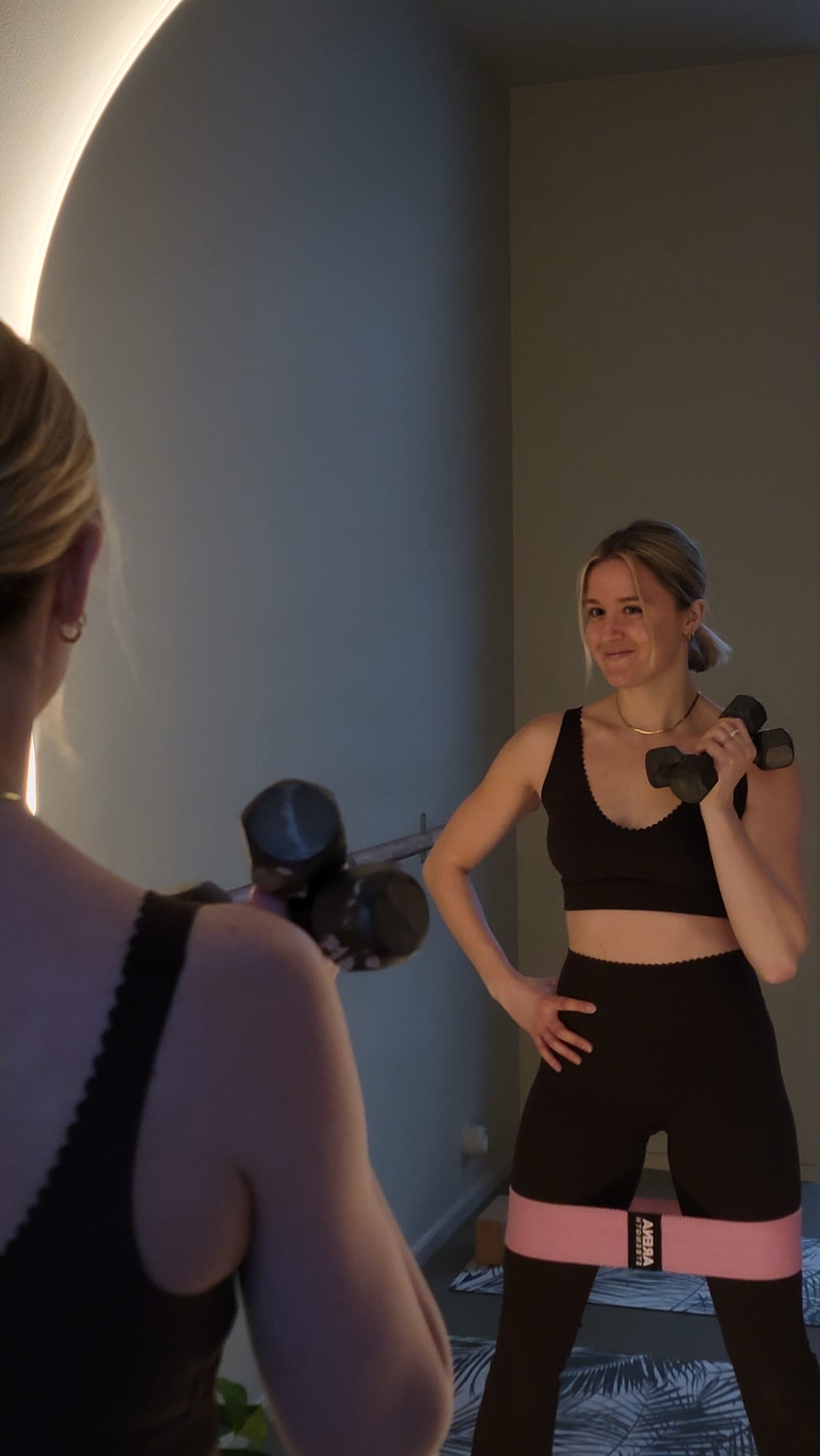 Personal strength training session in a private home studio